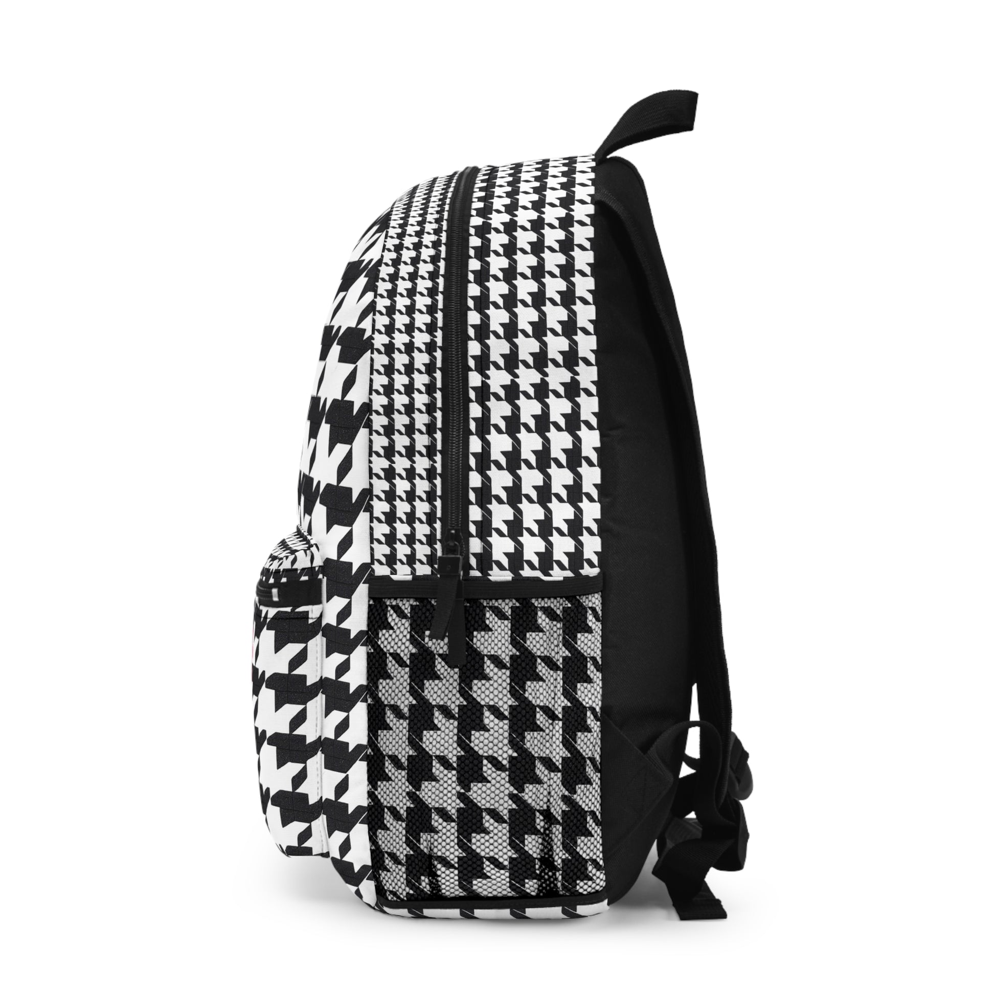 Stylish black and white patterned backpack featuring adjustable straps and durable design.