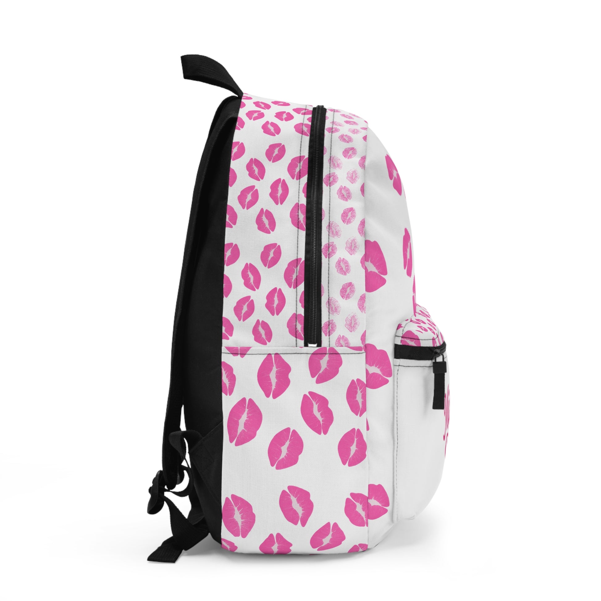 Backpack with pink kiss print design, durable and lightweight for everyday use.